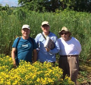Ken Cameron, Mary Ann Feist and Mark Wetter in the field